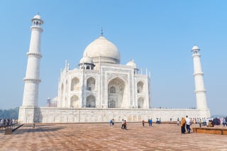 Awesome view of the Taj Mahal on blue sky background in Agra, India