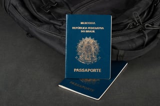 Brazillian passport on gray background with copy space