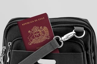 Close up of Chile passport in black travel bag pocket