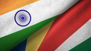 India And Seychelles Two Folded Flags Together