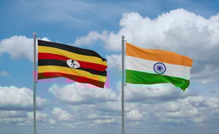 India and Uganda Flags Waving Together