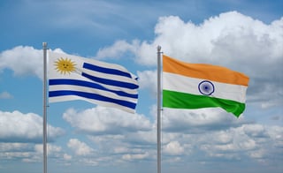 India And Uruguay Flags Waving Together On Blue Cloudy Sky Two Country Relationship