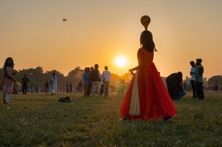 Indian girl playing badminton at Kolkata Maidan
