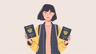 Person holding travel documents against a light background