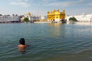 Pilgrim At The Golden Temple In The City Of Amritsar India Main Temple Of Sikh People
