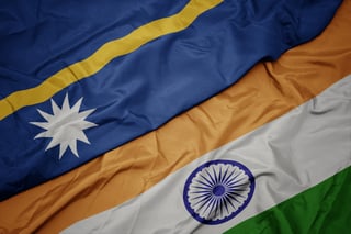 Waving Colorful Flag of India and National Flag of Nauru Macro