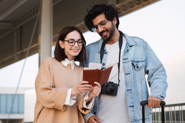 Cheerful Young Indian Man And Caucasian Woman