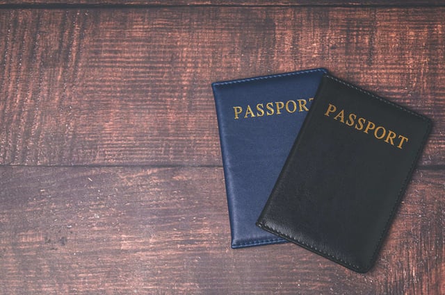 Passports On A Wooden Background